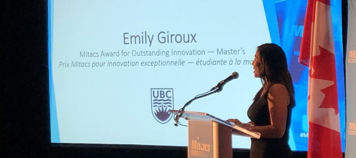 Emily Giroux receiving her Mitacs award