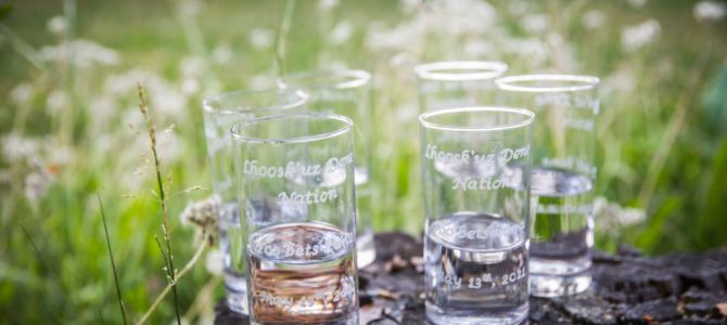 Glasses engraved with 'Too bets`huna,' meaning ‘We live by water’ celebrate the new treatment system. Photo: Nicole Marie Johnston/UBC