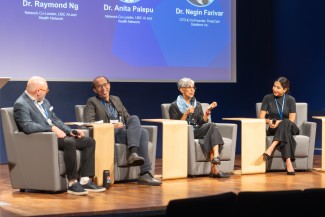 Panelists on a stage