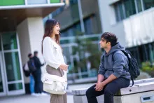 Two people talking