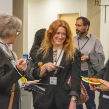 Photo of individuals talking 